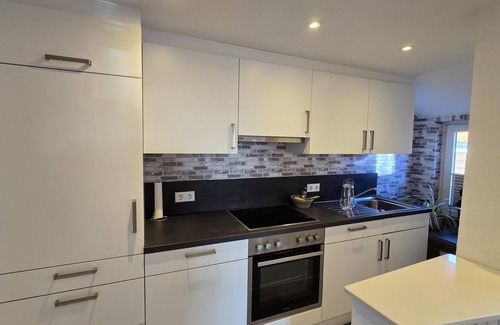 Dornumergrode Apartment | In a quiet residential area + fenced garden + free WiFi + by the sea + dogs welcome + modern furnishings