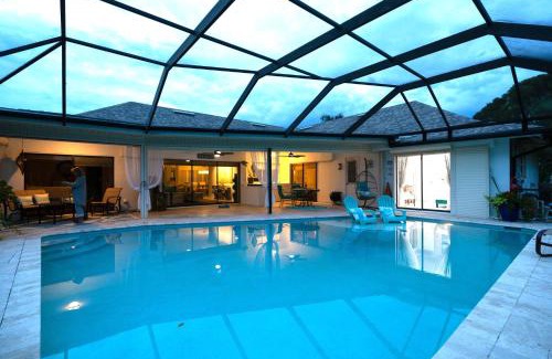 Kings Lake House | In the Heart of Naples, Suite with Lake & Pool