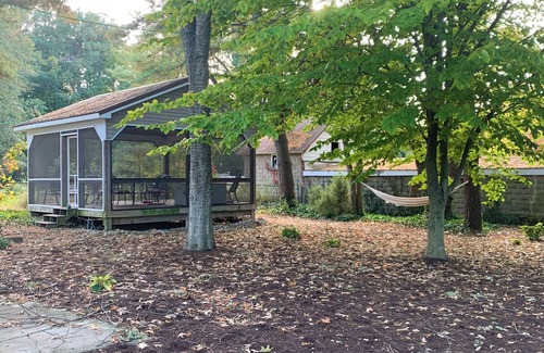 Rock Hall House | In town location with porches and shady patios