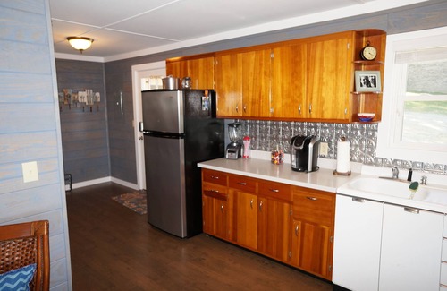 Gilbertsville House | Incredible sunrises await you as you drink coffee and overlook the main lake.