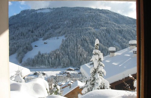 Le Grand-Bornand Apartment | Individual chalet facing the Aravis, south garden level with terrace and lawn