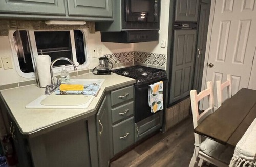 South Central House | Industrial Glamping Hideaway by Downtown