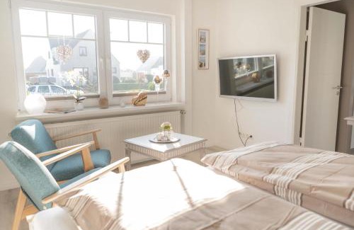 Landkirchen House | Inselblume 66 - Kuschlige Ferienwohnung für 2 in Landkirchen