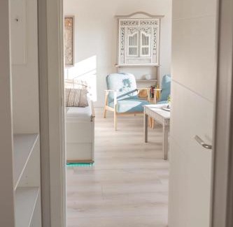 Landkirchen House | Inselblume 66 - Kuschlige Ferienwohnung für 2 in Landkirchen