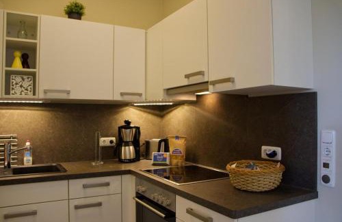 Fehmarn House | Inselblume 49 - Ferienwohnung im Erdgeschoss der Strandburg