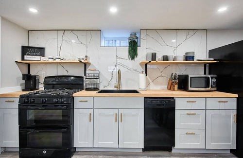 Speer House | Inspiring 2 bed/2 bath private entrance Basement Apartment