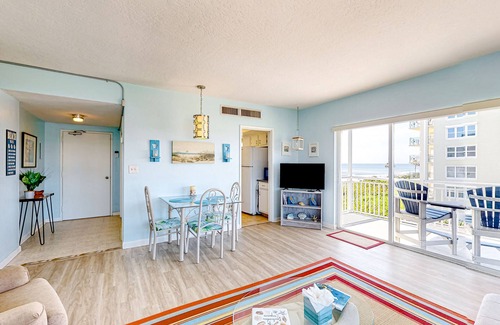 South Patrick Shores Condo | Inviting condo with ocean view, balcony, full kitchen, central AC, & W/D