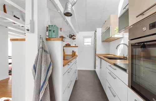 Karrebksminde House | Inviting cottage by the beach with a lake view