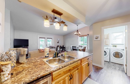 Post Falls House | Inviting dog-friendly home with hot tub, grill, patio, central AC, & W/D