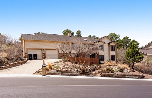 Northwest Colorado Springs House | Inviting home with mountain view, fireplace, kitchenette, & central AC