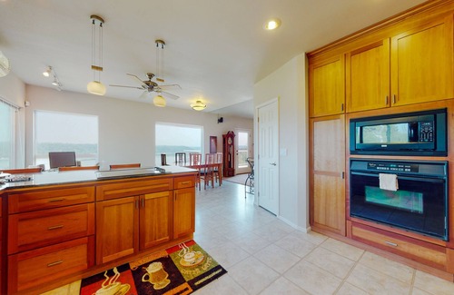 Union House | Inviting home with hot tub, water view, fireplace, pool table, & W/D