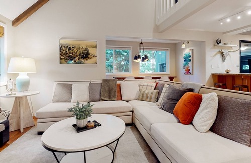 Lake Grove House | Inviting home with enclosed yard, firepit, hot tub, hammock, washer/dryer