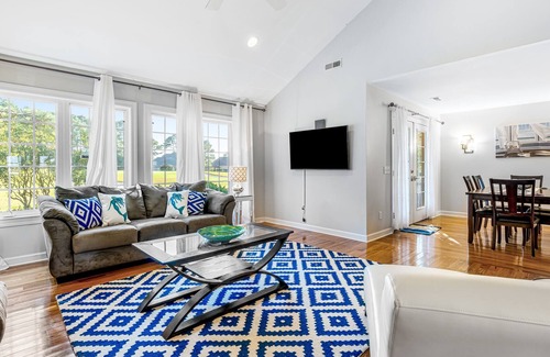 St. James House | Inviting house with nearby golf courses, charming patio, washer/dryer, AC