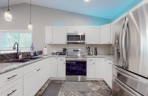 Mason County House | Inviting riverfront home with full kitchen, firepit, W/D, & dog-friendly