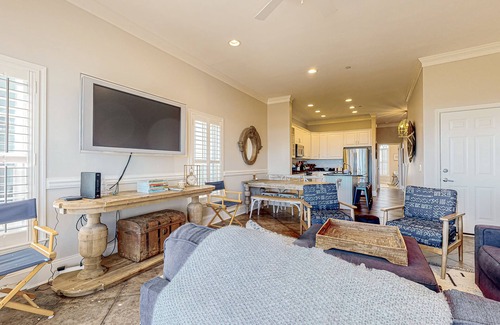 Waters Edge House | Inviting waterfront townhouse with beach access, balcony, W/D, pool & dock