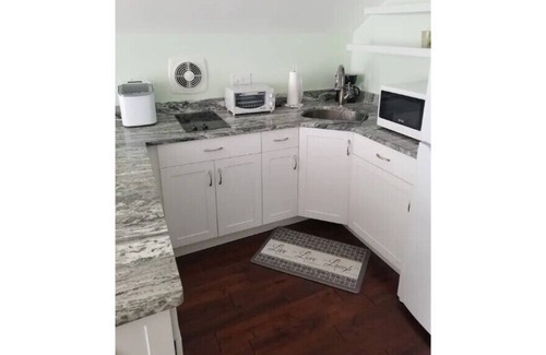 Pine Island Center House | Island Carriage House