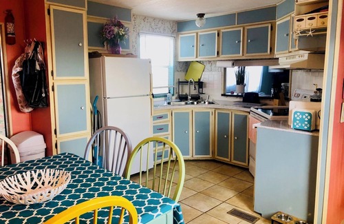 Flamingo Bay House | ISLAND TIME! DOCK! POOL! KAYAKS! BOAT To BEACH! PETS ALLOWED! The Purple House