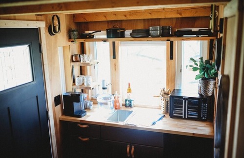 College House | It is a tiny home in the treehouse located in the middle of Fairbanks.