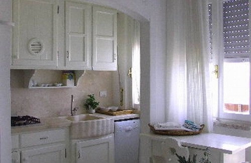 Marina di Castagneto Carducci Apartment | Flat directly by the sea, with stunning views from the terrace