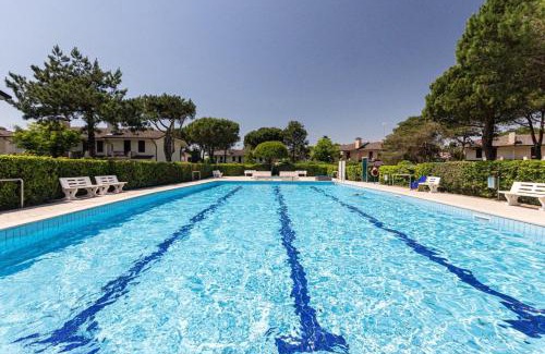 Porto Santa Margherita Villa | Spacious villa with private garden and shared pool