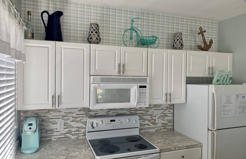 Sea Trail Condo | It's a beautiful time to visit! Golf course, 3rd floor, elevator, pet friendly!