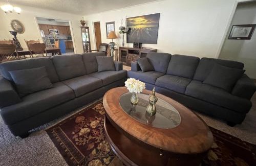 Mount Ida House | JI13- ,A two bedroom, one bath house with den, covered outdoor dining area and fenced in yard at our Joplin Inn home