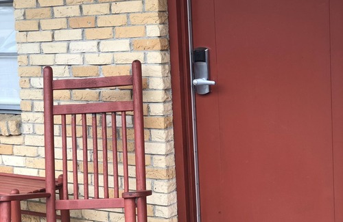 Mount Ida Apartment | JI6, King Guest Room at the Joplin Inn at entrance to the resort by RedAwning