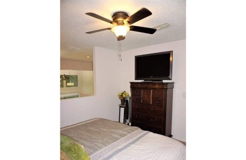 Lutz House | JIM MILLER 2 BDRM "ISLAND BREEZE" w/GOLFCART T-1