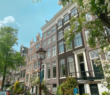 Amsterdam City Centre House | JoyJoyJoy the Green Palm ecolicious studio in a in historic Canalhouse from 1729 with view on the canals