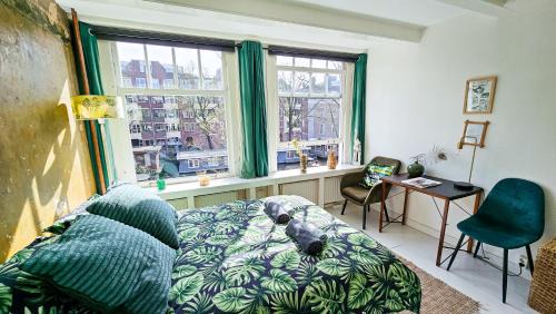 Amsterdam City Centre House | JoyJoyJoy the Green Palm ecolicious studio in a in historic Canalhouse from 1729 with view on the canals
