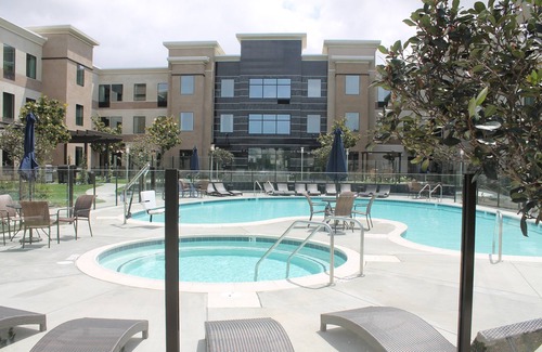 Bressi Ranch Condo | Just 4-Minutes from the Airport | Breakfast Included, Pool Access