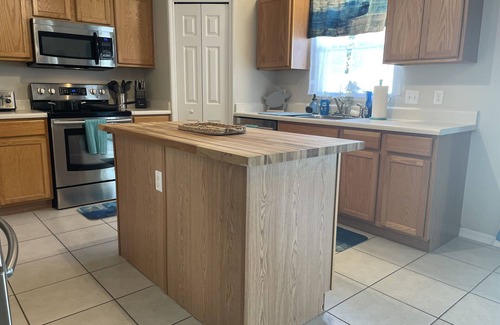 Florida Shores House | Just minutes from the ocean Lg 4 bedroom with fenced in saltwater pool!