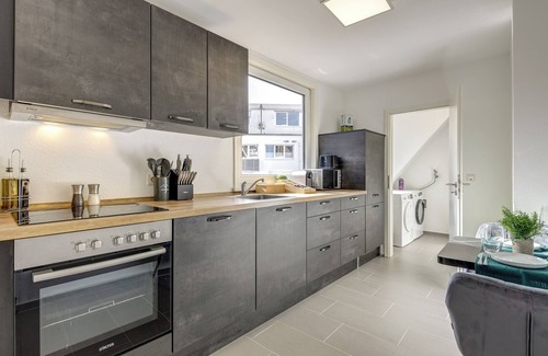 Mitte Apartment | K&M: Central | With workstation | Close to RMCC