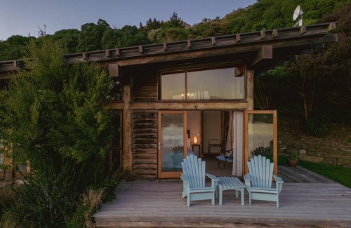 Cape Saunders Resort | Kahu Studio Wake up with a stunning view from the Papanui Inlet