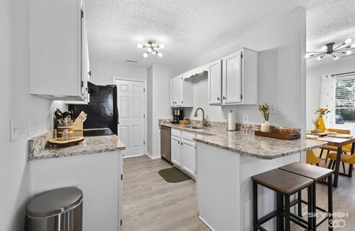 Bentonville House | Kid, bike, dog, & work friendly. Foosball table! Razorback Greenway close by!