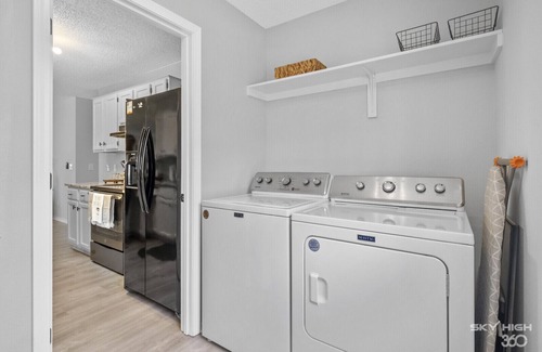 Bentonville House | Kid, bike, dog, & work friendly. Foosball table! Razorback Greenway close by!