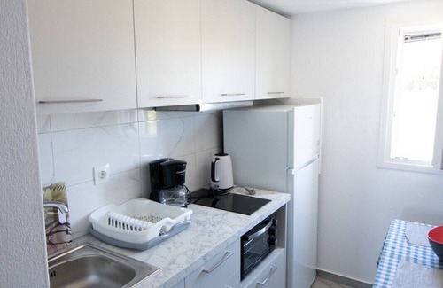 Chrissi Akti Apartment | Kiki's dream refurbished apartment with a bacony and sea views