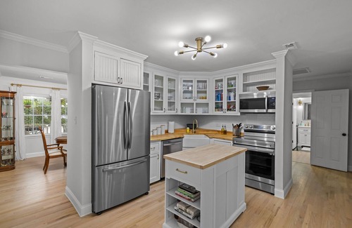 Kimmswick House | Kimmswick Porch Haven: Hot Tub, Cozy Fire Pit, & Fenced Yard!