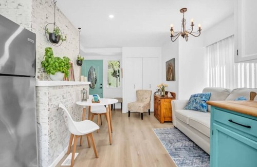 Lynn Valley House | King Bed with front door parking and private courtyard. Designed for living.