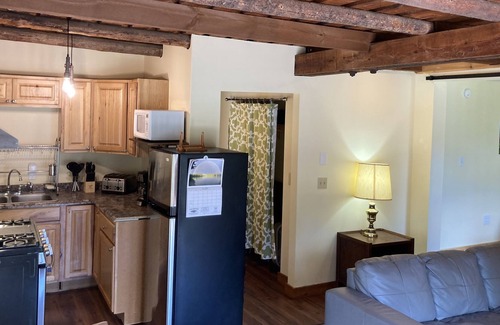 Elkins Apartment | King bedroom apartment with full laundry at Deepwell Farm