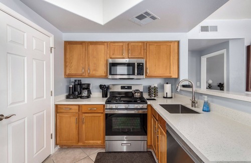 Maryvale Condo | KING Beds, Heated Community Pool! 3 miles from Cardinal Stadium!