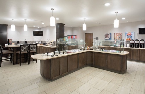 Rapid City Apartment | King Suite. Free Breakfast. Pool & Hot Tub. Great for Business Travelers!