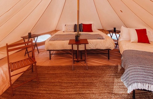 Valle House | King Tent w/Shared Bathroom - Find us among the juniper trees and the open sky.