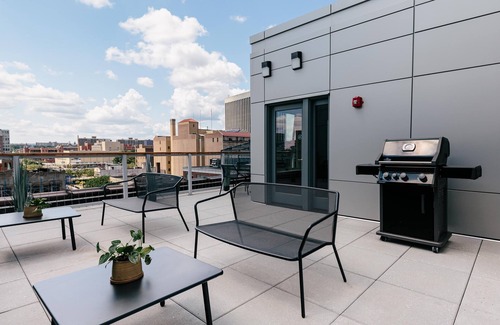 Central Business District Apartment | Kislak 407 Stunning 2BR with Den Corner Apt Retreat Above the City