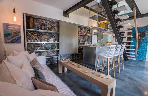 Halepa House | kito- transformed house on the water's edge