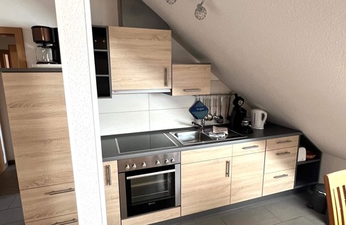 Altenhagen Apartment | Komf. Mod. Apartment with sitting area in the garden near Steinhuder Meer