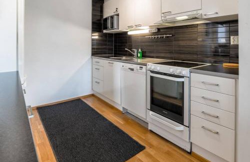 Keskinen District Apartment | Kotimaailma - Avara ja valoisa kolmio saunalla lähellä Helsingin keskustaa