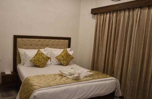 Gangavathi Hotel | Kyriad Sarvesh Gangavathi Hampi