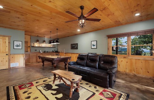 Mineral Bluff House | L Attitude Adjustment - Mineral Bluff GA - Enjoy king suites, a hot tub, a game room, a wood-burning fireplace, and a fenced yar
