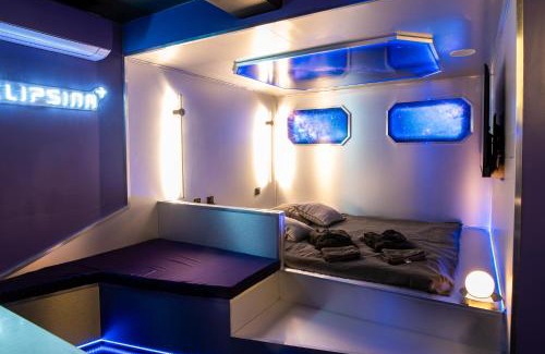 Centre-ville Apartment | L'Eclipsina - Logement Insolite dans un Univers Futuriste